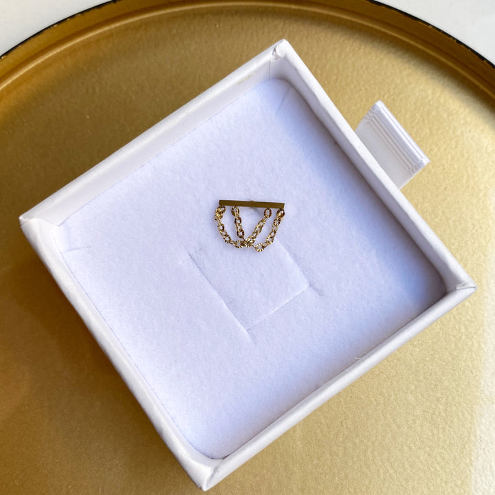 Boucle d'oreille à l'unité Sacha