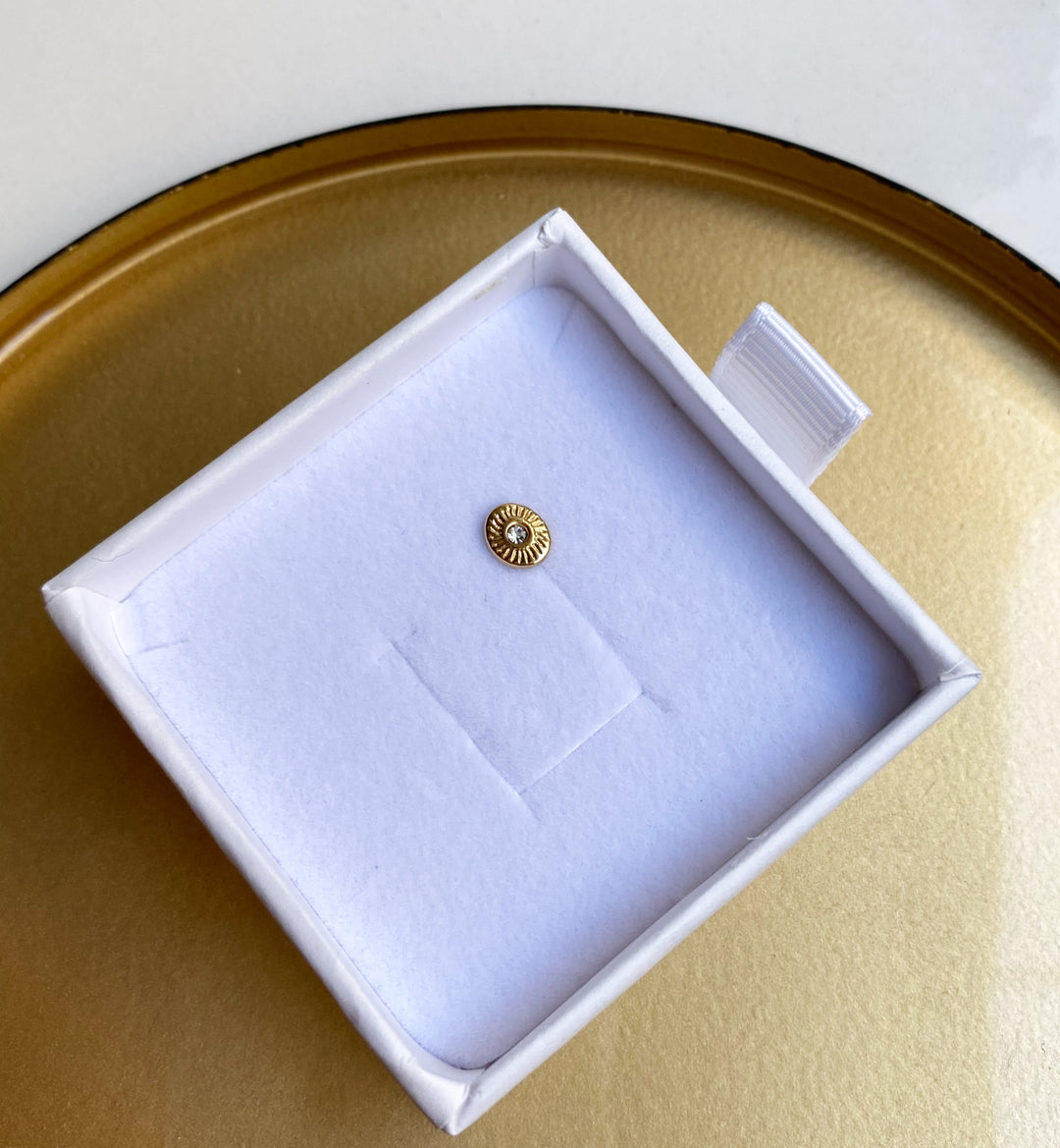 Boucle d'oreille à l'unité Larry